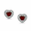Thumbnail Image 0 of Heart-Shaped Garnet and 0.15 CT. T.W. Diamond Frame Stud Earrings in Sterling Silver