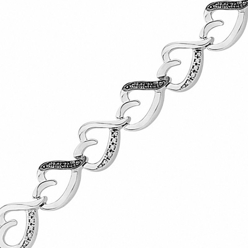 0.16 CT. T.W. Enhanced Black and White Diamond Tilted Heart Link Bracelet in Sterling Silver