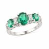 Thumbnail Image 0 of Oval Lab-Created Emerald and Diamond Accent Ring in Sterling Silver