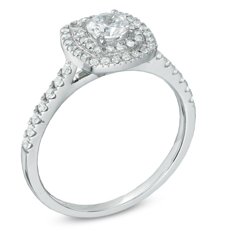 0.71 CT. T.W. Certified Canadian Diamond Frame Engagement Ring in 14K White Gold (I/I1)