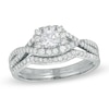 Thumbnail Image 0 of 0.70 CT. T.W. Certified Canadian Diamond Twist Shank Bridal Set in 14K White Gold (I/I1)