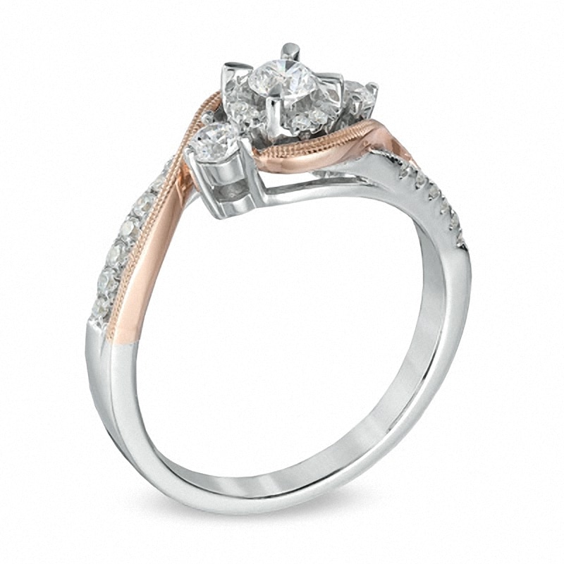 0.50 CT. T.W. Diamond Three Stone Swirl Engagement Ring in 10K Two-Tone Gold