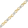 Thumbnail Image 0 of 0.13 CT. T.W. Diamond Cluster Infinity Link Bracelet in 10K Gold