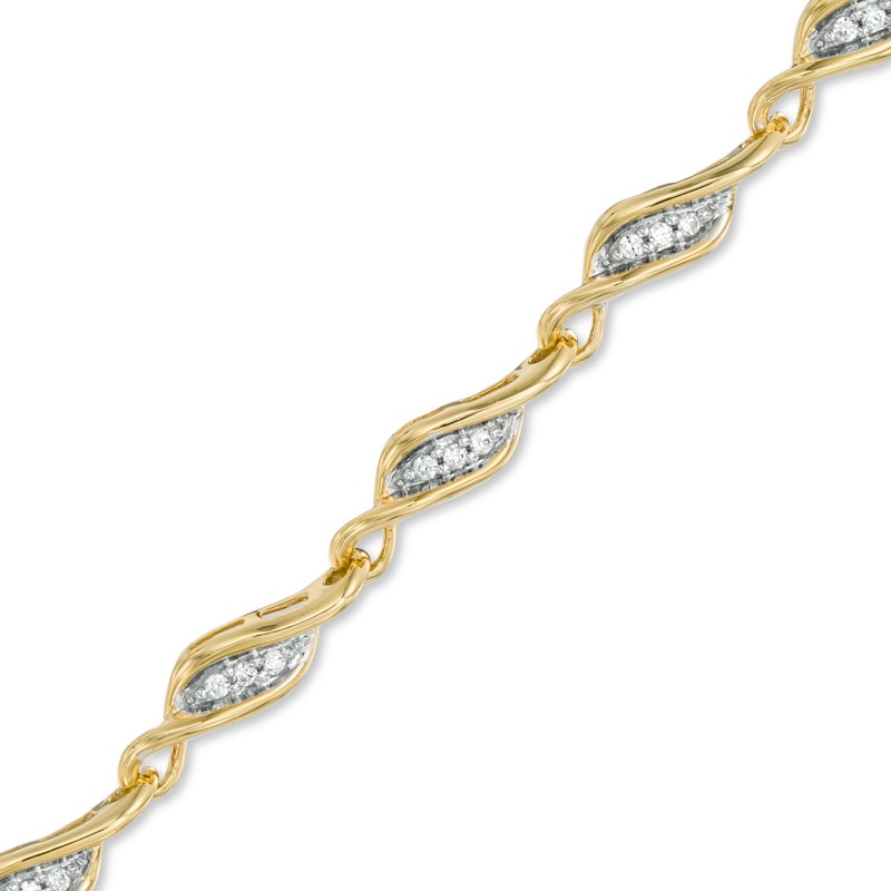0.25 CT. T.W. Diamond Cascading Swirl Bracelet in 10K Gold