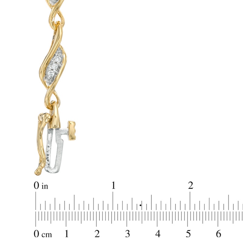 0.25 CT. T.W. Diamond Cascading Swirl Bracelet in 10K Gold