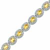 Thumbnail Image 0 of Oval Lab-Created Yellow Sapphire and Diamond Accent Bracelet in Sterling Silver - 7.5"