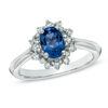 Thumbnail Image 0 of Oval Blue Sapphire and 0.12 CT. T.W. Diamond Ring in 10K White Gold