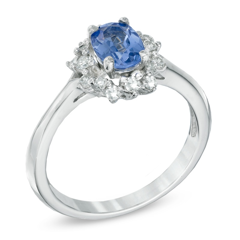 Oval Blue Sapphire and 0.12 CT. T.W. Diamond Ring in 10K White Gold
