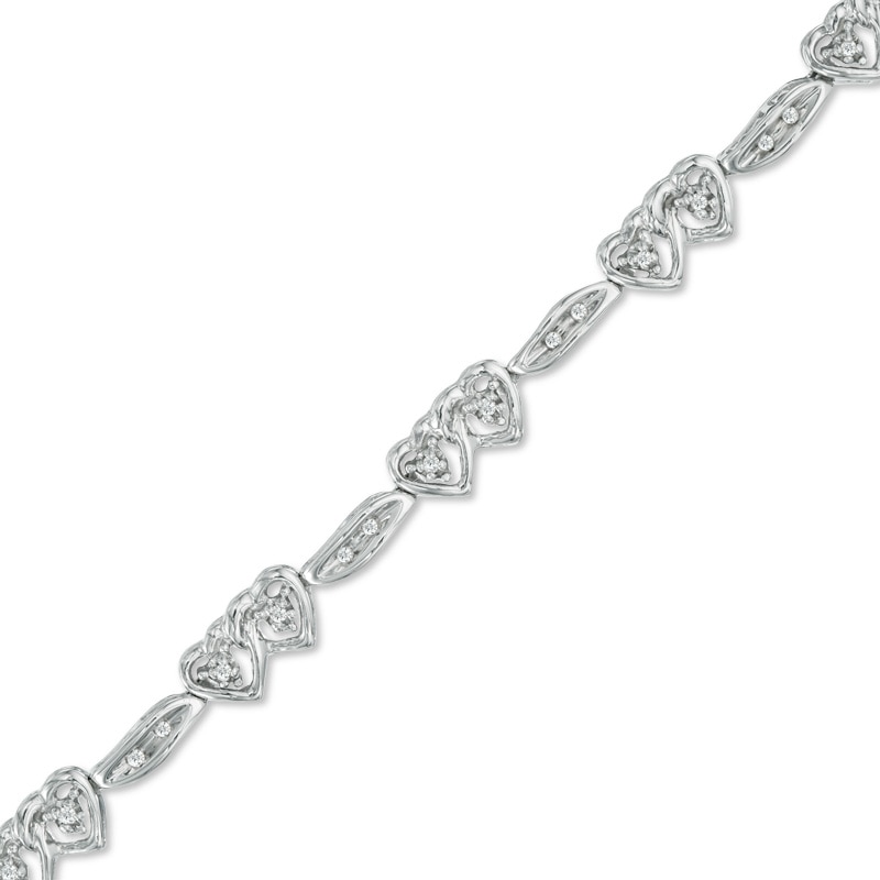 0.16 CT. T.W. Diamond Interlocked Hearts Station Bracelet in Sterling Silver