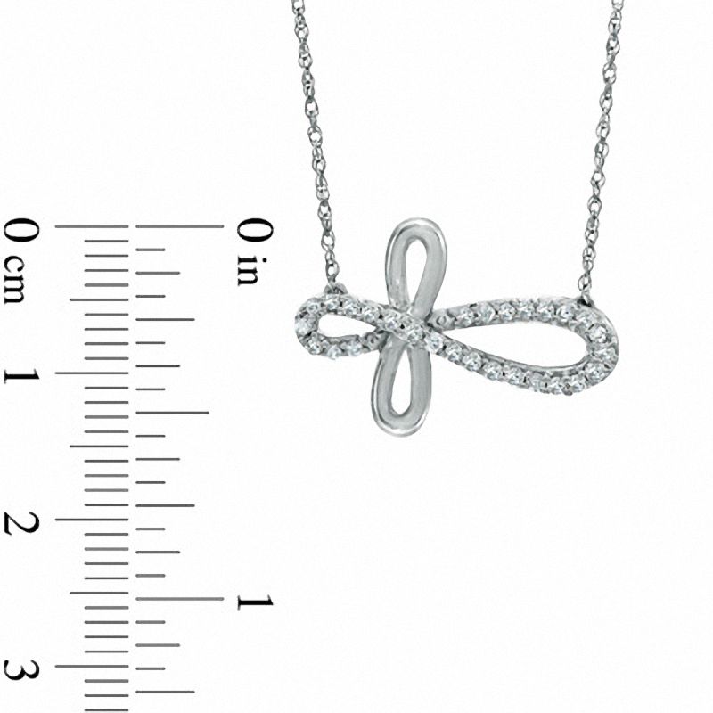 0.25 CT. T.W. Diamond Sideways Loop Cross Necklace in Sterling Silver