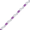 Thumbnail Image 0 of Oval Amethyst and Diamond Accent Bracelet in Sterling Silver - 7.5"