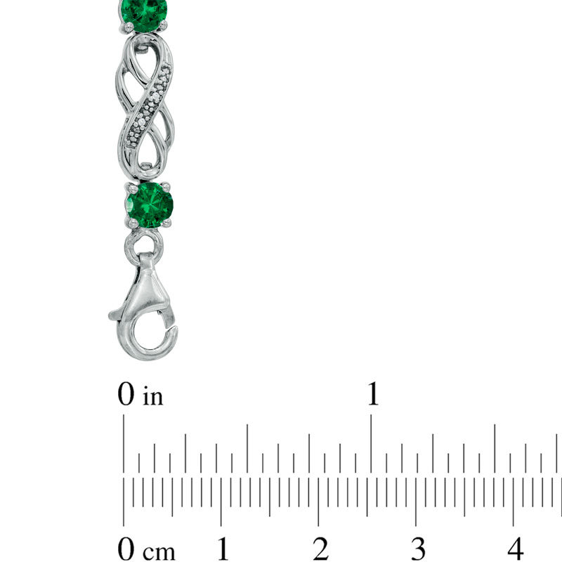 Lab-Created Emerald and 0.04 CT. T.W. Diamond Infinity Bracelet in Sterling Silver - 7.5"