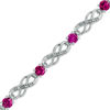 Thumbnail Image 0 of Lab-Created Ruby and Diamond Accent Infinity Bracelet in Sterling Silver - 7.5"
