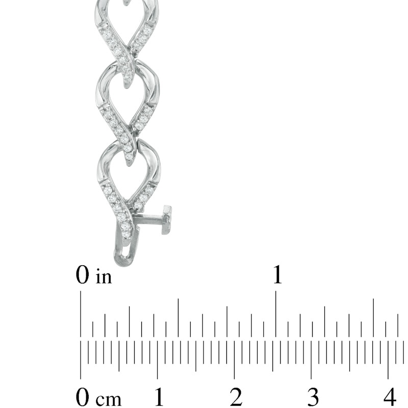 0.95 CT. T.W. Diamond Flame Link Bracelet in 10K White Gold - 7.25"