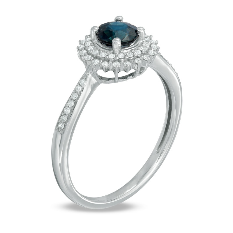 5.0mm Blue Sapphire and 0.15 CT. T.W. Diamond Sunburst Frame Ring in 10K White Gold