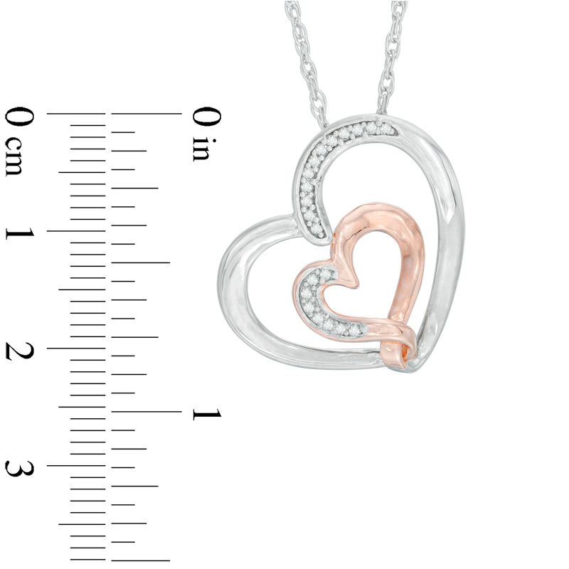 0.12 CT. T.W. Diamond Double Heart Pendant in Sterling Silver and 14K Rose Gold Plate