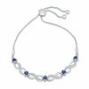 Thumbnail Image 0 of Lab-Created Blue Sapphire and 0.09 CT. T.W. Diamond Five Stone Infinity Bolo Bracelet in Sterling Silver - 9.5"