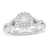 Thumbnail Image 0 of 0.50 CT. T.W. Certified Canadian Diamond Frame Twist Shank Engagement Ring in 14K White Gold (I/I2)