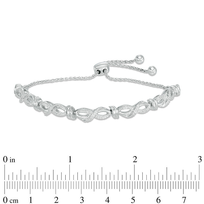 0.18 CT. T.W. Diamond Infinity Wave Bolo Bracelet in Sterling Silver - 9.5"
