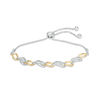 Thumbnail Image 0 of 0.23 CT. T.W. Diamond Alternating Three Stone Bolo Bracelet in Sterling Silver and 10K Gold - 9.5"
