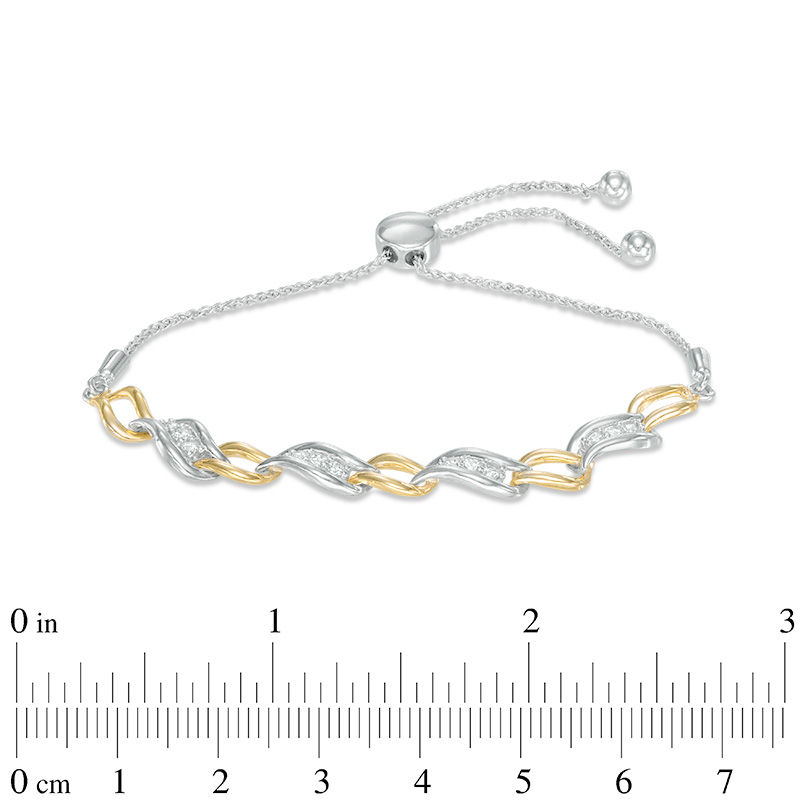 0.23 CT. T.W. Diamond Alternating Three Stone Bolo Bracelet in Sterling Silver and 10K Gold - 9.5"