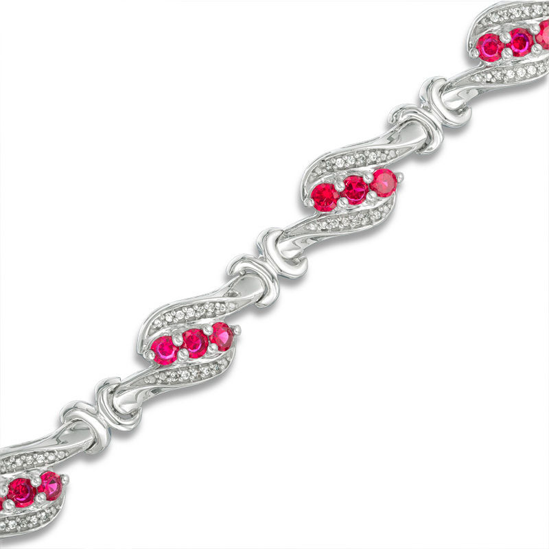 Lab-Created Ruby and 0.23 CT. T.W. Diamond Swirl Three Stone Bracelet in Sterling Silver - 7.5"