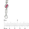 Thumbnail Image 1 of Lab-Created Ruby and 0.23 CT. T.W. Diamond Swirl Three Stone Bracelet in Sterling Silver - 7.5"