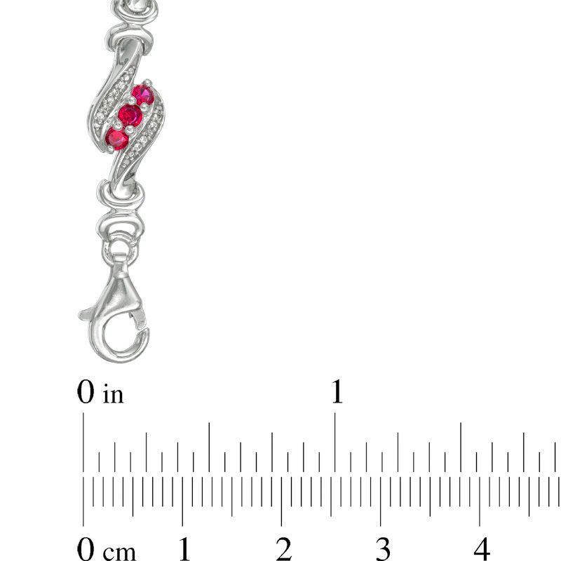 Lab-Created Ruby and 0.23 CT. T.W. Diamond Swirl Three Stone Bracelet in Sterling Silver - 7.5"