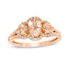 Thumbnail Image 0 of Oval Morganite and 0.12 CT. T.W. Diamond Frame Three Stone Ring in 10K Rose Gold