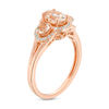 Thumbnail Image 1 of Oval Morganite and 0.12 CT. T.W. Diamond Frame Three Stone Ring in 10K Rose Gold