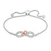 Thumbnail Image 0 of Diamond Accent Infinity and Heart Bolo Bracelet in Sterling Silver and 10K Rose Gold - 9.5"