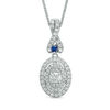 Thumbnail Image 0 of Vera Wang Love Collection 0.45 CT. T.W. Diamond and Blue Sapphire Oval Frame Pendant in 14K White Gold - 19"