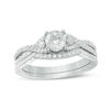 Thumbnail Image 0 of 0.88 CT. T.W. Certified Canadian Diamond Twist Bridal Set in Platinum (H/VS2)