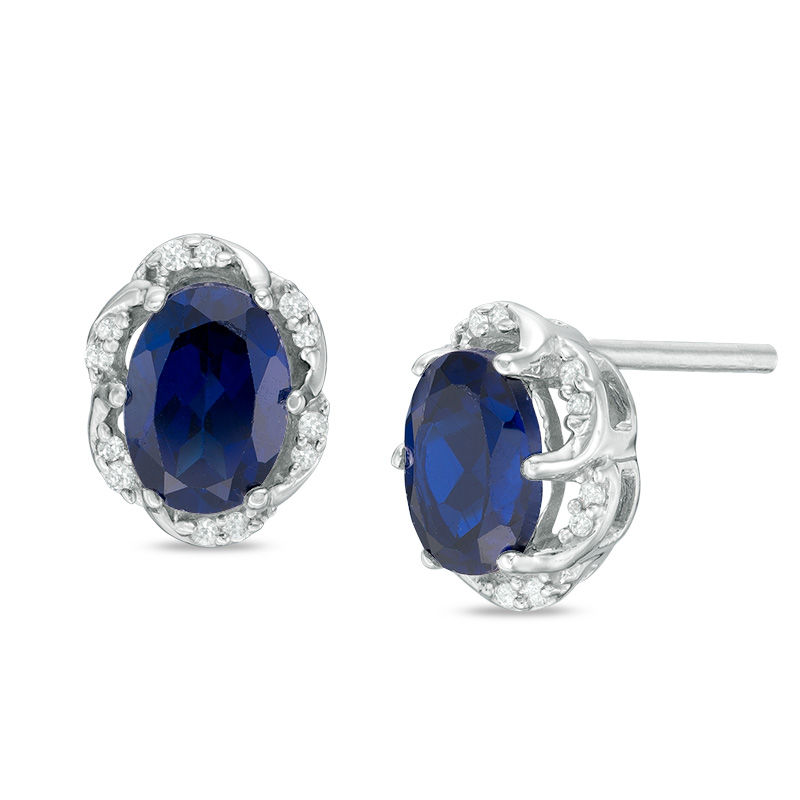Oval Lab-Created Blue Sapphire and 0.09 CT. T.W. Diamond Frame Stud Earrings in Sterling Silver