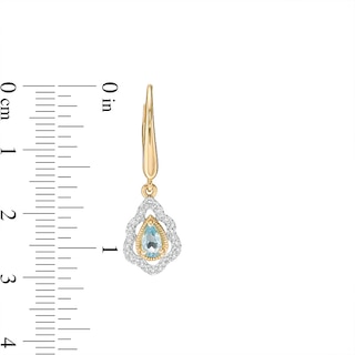 Previously Owned - Pear-Shaped Swiss Blue Topaz and 0.18 CT. T.W. Diamond Scallop Frame Drop Earrings in 10K Gold|Peoples Jewellers