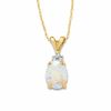 Oval Opal Pendant in 10K Gold with Tri-Top Diamond Accents