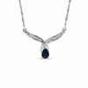 Thumbnail Image 0 of Pear-Shaped Blue Sapphire and Diamond Accent Wing Pendant in 10K White Gold - 16"