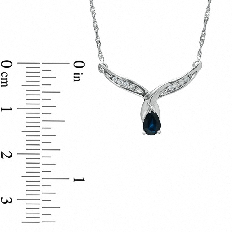 Pear-Shaped Blue Sapphire and Diamond Accent Wing Pendant in 10K White Gold - 16"