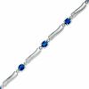 Thumbnail Image 1 of Oval Sapphire and Diamond Accent Bracelet in 10K White Gold - 7.25"