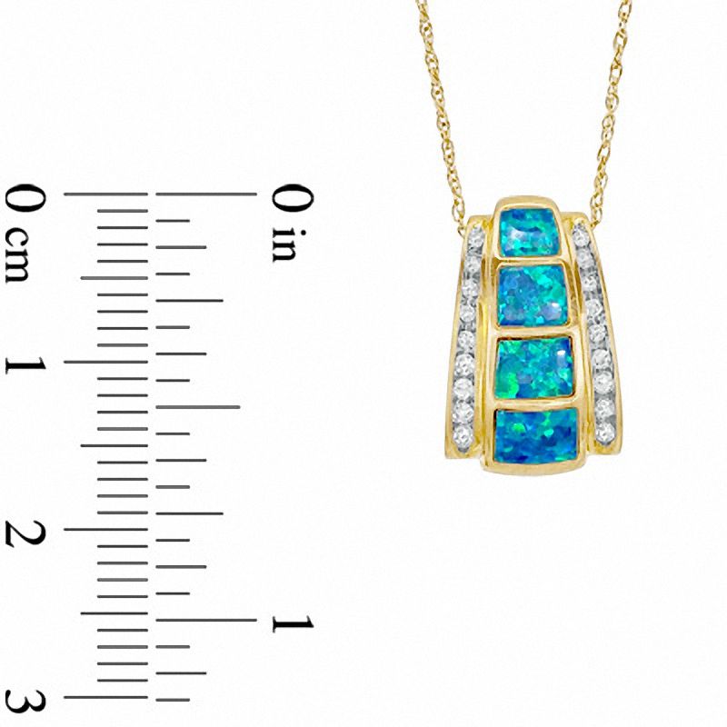 Cabochon Lab-Created Opal Inlay and 0.10 CT. T.W. Diamond Pendant in 10K Gold