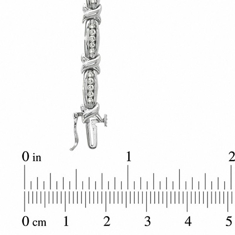 Main Image 3 of 1.00 CT. T.W. Diamond Channel "X" Bracelet in 10K White Gold