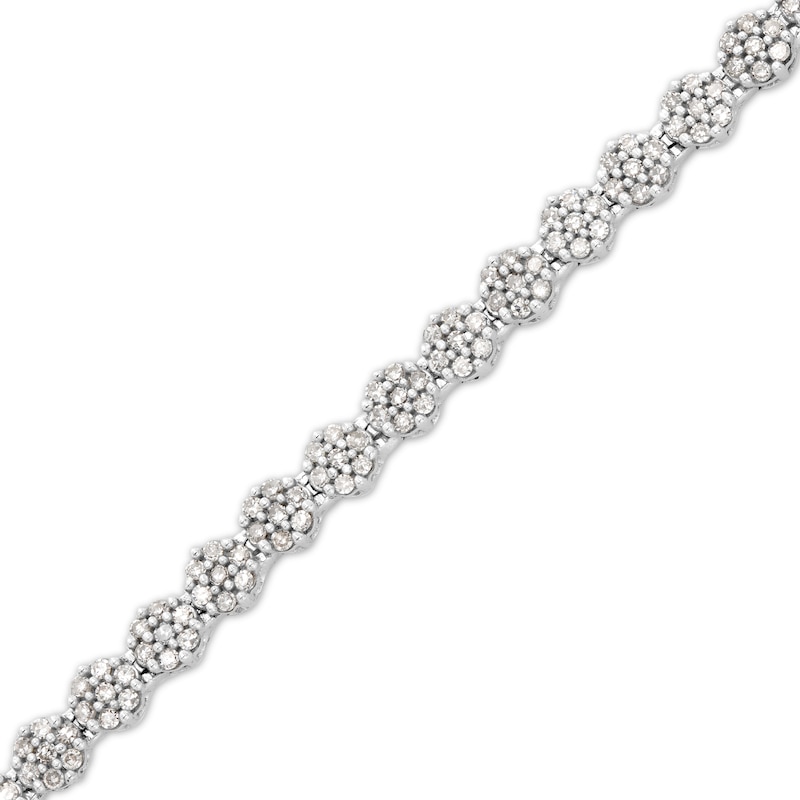 1.00 CT. T.W. Diamond Flower Tennis Bracelet in 10K White Gold