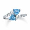 Thumbnail Image 0 of 5.0mm Trillion-Cut Blue Topaz Bypass Ring in 10K White Gold with Diamond Accents