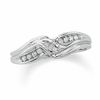 10K White Gold Crossover Ring with Round and Baguette Diamond Accents