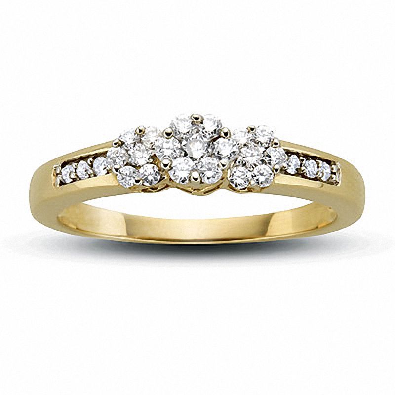 0.20 CT. T.W. Diamond Flower Three Stone Ring in 10K Gold