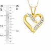 Thumbnail Image 2 of 0.50 CT. T.W. Diamond Channel Crossover Heart Pendant in 10K Gold