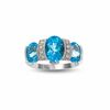 Oval Blue Topaz Three-Stone Ring in 10K White Gold with Diamond Accents