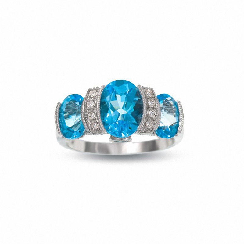 Main Image 1 of Oval Blue Topaz Three-Stone Ring in 10K White Gold with Diamond Accents