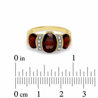 Oval Garnet and Diamond Ring in 10K Gold