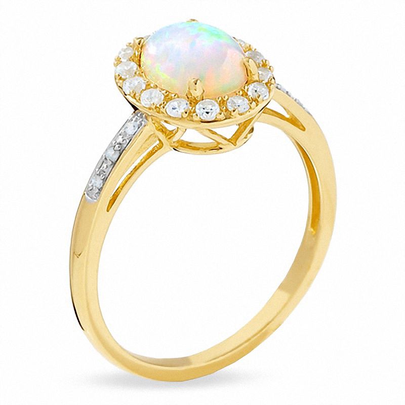 Oval Lab-Created Opal and White Sapphire Ring in 14K Gold with Diamond Accents